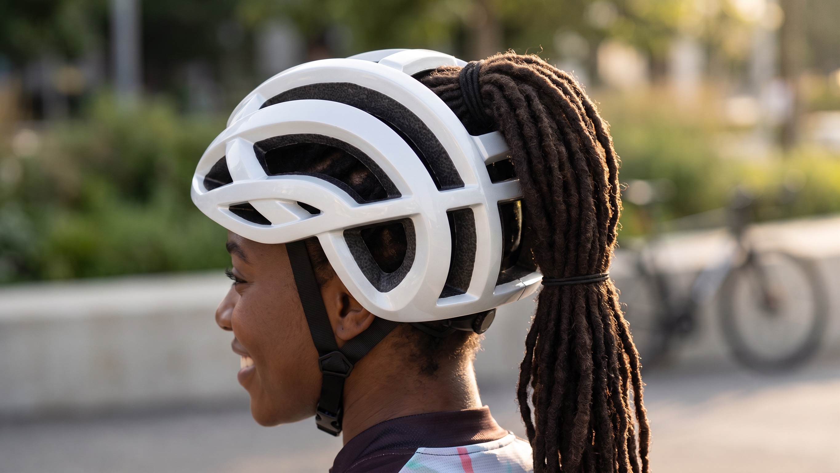 Rider with locs wearing the helmet